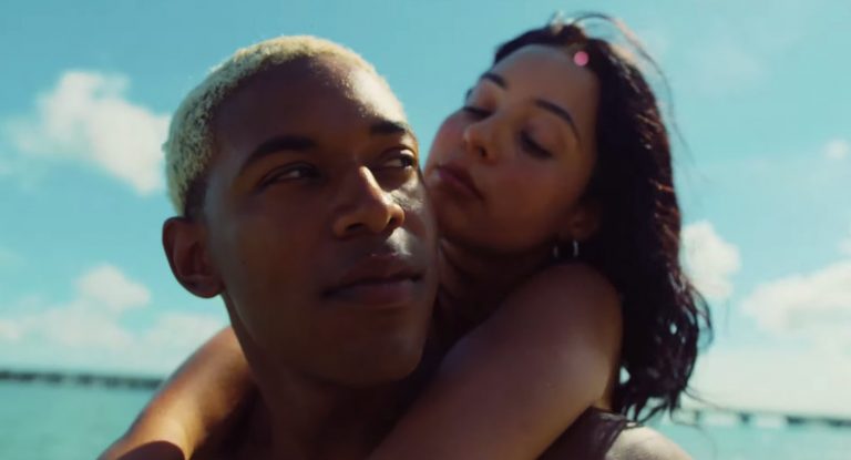 "Waves" scene couple at the beach. Keep reading for a performance review.